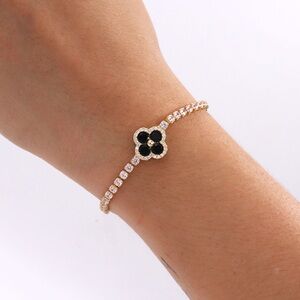 Elegant Gold and Black Bracelet